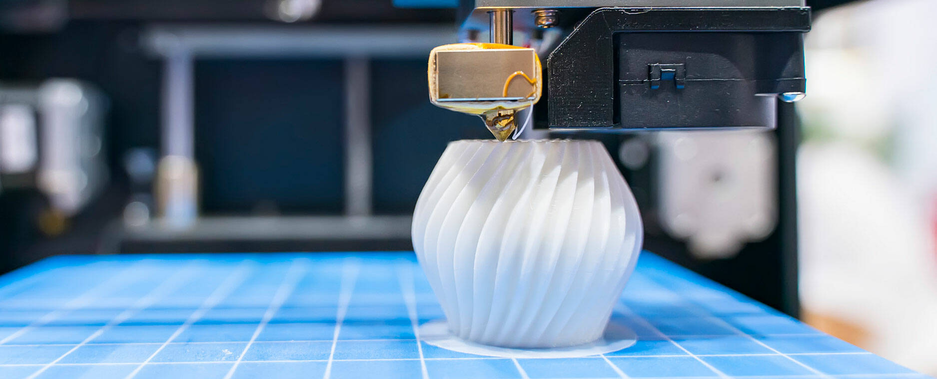 3D printer manufacturing an object